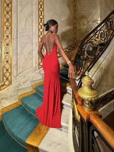 Elegant red backless bodycon maxi evening dress with chain straps and fishtail hem