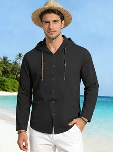Close-up of men's black cotton hooded shirt fabric texture with buttons and drawstrings