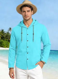 Detail of light blue hooded cotton shirt featuring button closure and drawstring neck
