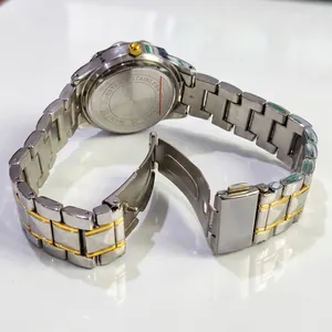 Close-up of dual-tone metal strap and stainless steel back of the quartz watch