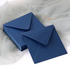 Navy blue pearlescent thick paper envelopes in European triangular flap style for weddings