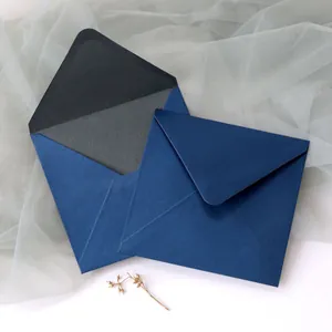 Square dark blue pearlescent paper envelopes with elegant inner lining for wedding cards