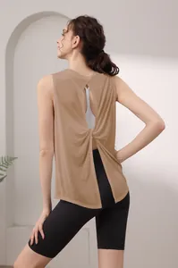 Detail of camel sports vest featuring an open back design with a stylish back knot
