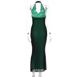 Detail of sheer mesh gradient dress featuring a deep V-neck and halter backless design