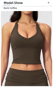 Front model view of a black coffee V-neck halter sports bra with brushed texture