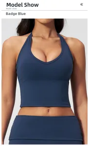 Detail view of the V-neck halter sports bra in emblem blue showing premium fabric texture