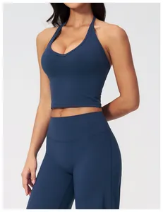 Detailed view of dark blue high-stretch fabric on halter neck yoga sports vest