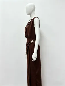 Detailed side view of brown sleeveless maxi dress with golden ring waist buckle decoration