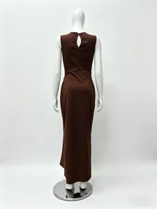 Back view of brown sleeveless maxi dress with a teardrop cutout detail on a mannequin
