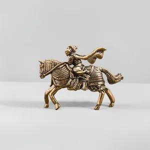 Macro detail of solid brass Monkey King figurine riding a horse on a sleek stand