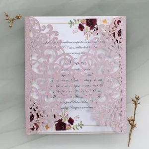 Detailed laser cut vine pattern on pink glitter cardstock for XV Años invitations