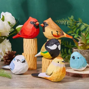 Set of six handcrafted wooden bird figurines with geometric hand-painted details