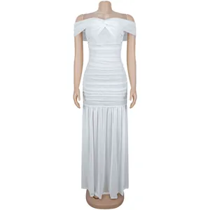 Detail of white ruched mesh fabric on a sexy strapless off-shoulder maxi dress
