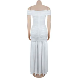 Detail of white ruched mesh dress showing back hidden zipper and textured fabric