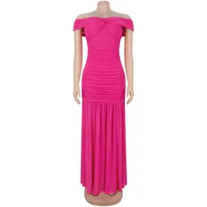 Detailed view of ruched hot pink mesh strapless tube bodycon dress with twist knot