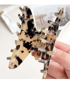 Macro shot of tortoiseshell cellulose acetate large hair claw with durable metal spring