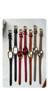Close-up of elegant oval quartz watches with diverse leather straps in seven colors