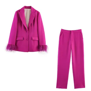Magenta women's blazer and pants set with stylish feather cuffs on sleeves