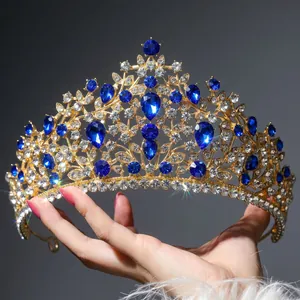 Baroque gold bridal crown with large blue crystals and white rhinestones for parties
