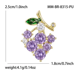 Cute purple crystal grape brooch with green leaf and size parameters in white background