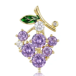 Cute crystal grape brooch with purple gemstones and green enamel on gold base
