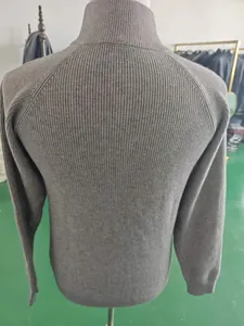 Back view of dark grey men's knit cardigan with ribbed texture and raglan sleeves