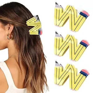 Détails macro des pinces à cheveux crayon en pack de 3 montrant la pointe et la gomme