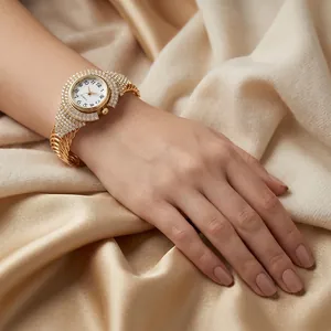 Close-up of luxury women's quartz watch with gold twisted strap and crystal bezel