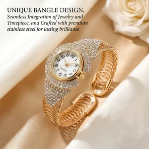 Macro shot of gold quartz bangle watch with crystal bezel on elegant satin background