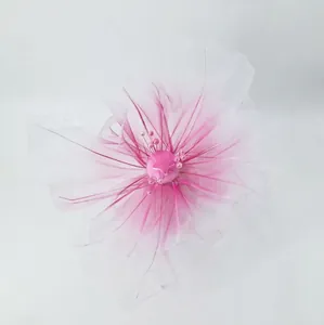 Detail of pink and white gradient mesh gauze wedding flower with pearl stamen decor