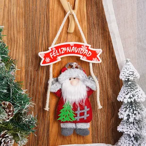 Detail of Santa plush ornament with Feliz Navidad banner and non-woven fabric textures