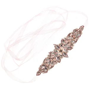 Sparkling bridal belt with silver rhinestones, pearls and light pink organza ribbon