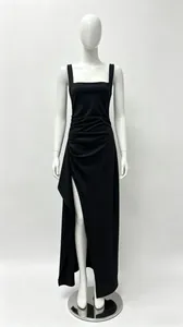 Detail view of the black sleeveless evening dress featuring side ruching and a high slit