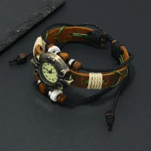 Detailed close-up of brown leather weave strap with wooden beads and bronze case