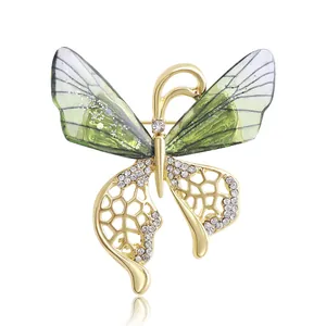 Élégante Broche Papillon en Alliage et Strass pour Femme Mode Dégradé Ajouré Insecte Épingle pour Manteau Costume Accessoires