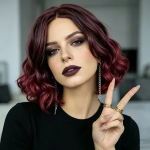 Close-up of burgundy wavy bob wig with soft texture and natural shine on female model