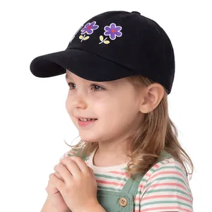 Close-up of high-quality floral embroidery on black cotton baseball cap for girls