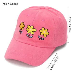 Pink cotton baseball cap for girls with yellow flower embroidery and curved brim