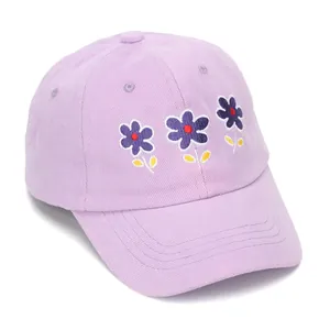 Detailed embroidery of three small purple flowers on a light purple cotton baseball cap