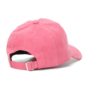 Rear view of pink cotton baseball cap featuring adjustable metal buckle and stitching