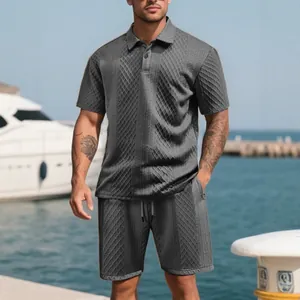 Men's dark grey polo and shorts set featuring diamond jacquard texture and drawstring