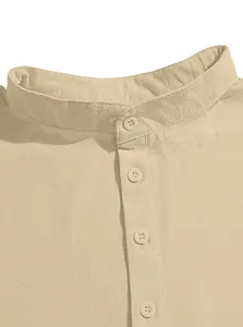 Detailed view of the band collar and resin buttons on a beige linen blend shirt