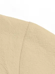 Macro shot showing high-quality stitching and linen blend texture on casual shirt shoulder