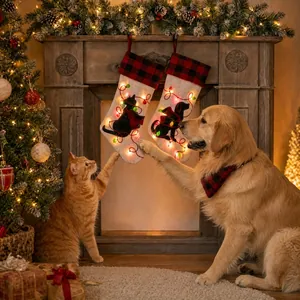 LED light-up Christmas stockings with cat and dog silhouettes on linen fabric