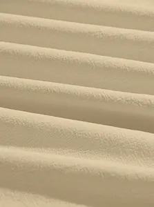 Macro detail of breathable beige linen blend fabric with premium woven texture