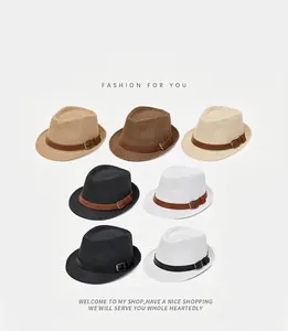 Detail view of woven fedora hats in seven colors with decorative leather bands