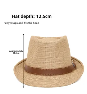Detail view of khaki straw fedora hat featuring a 12.5cm deep crown and leather strap