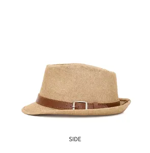 Side view of classic straw jazz hat with brown faux leather band and metal buckle