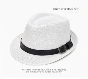 Detailed texture of white breathable straw jazz hat with black leather belt and metal buckle