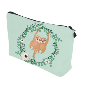 Detail view of water-resistant mint green pouch with cute sloth print and black zipper